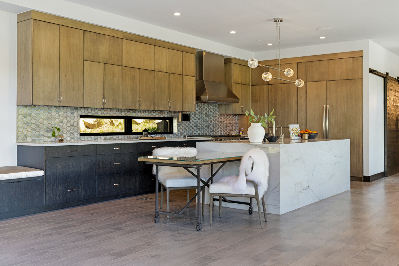 Chef's kitchen with quartzite island and custom cabinetry