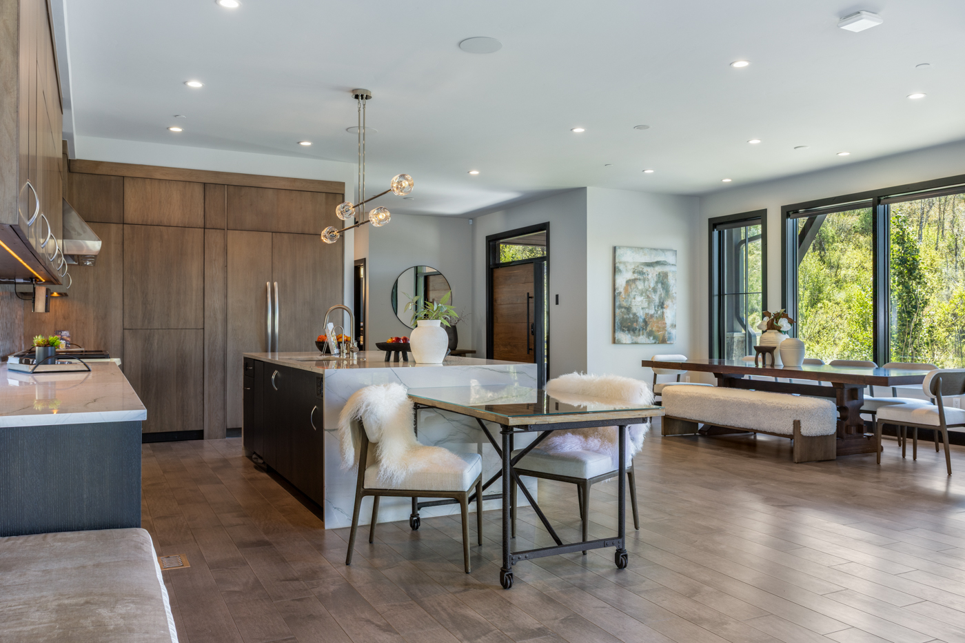 Open kitchen, breakfast, and dining spaces