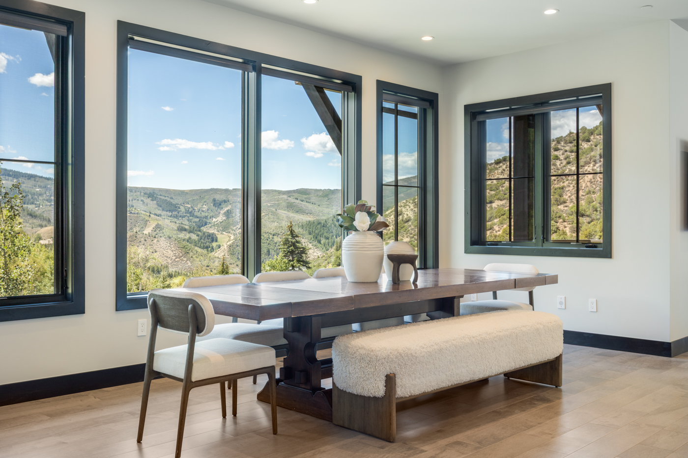 Dining room framed by mountain views