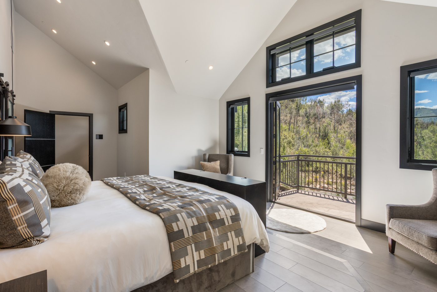 Primary suite opening to a private deck